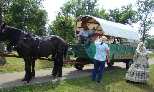 Riders enjoying the horse and wagon ride were greeted by Mayor Carpenter and wife, Sharon.
