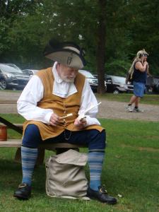 Member of the Wayward Companions plays a jawbone.