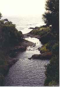 Seven Sacred Pools lead to the Black Sand Beach
