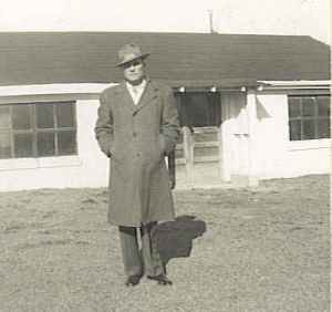 Dad dons his felt hat.