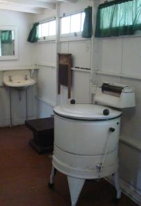 Laundry Room with wringer washer and washboard