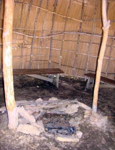Inside the wigwam centers around a fireplace.