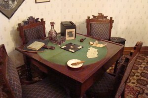 The wealthy played Whisk around the game table.