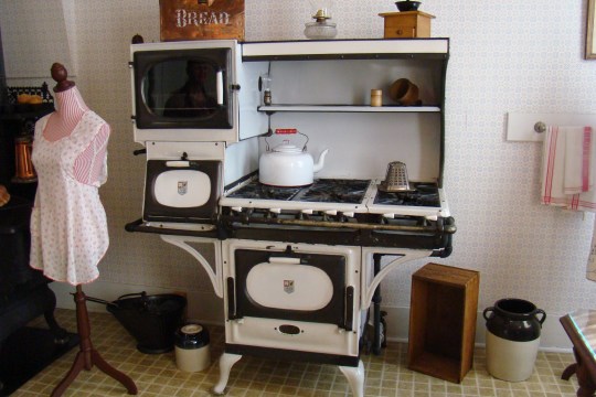 Reeves kitchen displays a warmer oven, local made teapot, and old-fashioned toaster.