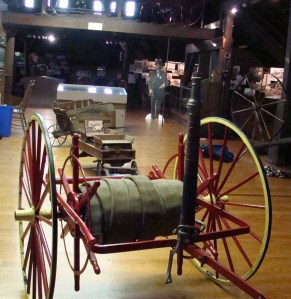 This horse drawn fire wagon had a two man seat, which was unusual at that time.