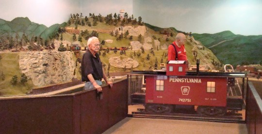 Engineers ready the O-gauge trains for the summer season.