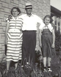 Dad wears his straw hat with his two favorite girls.