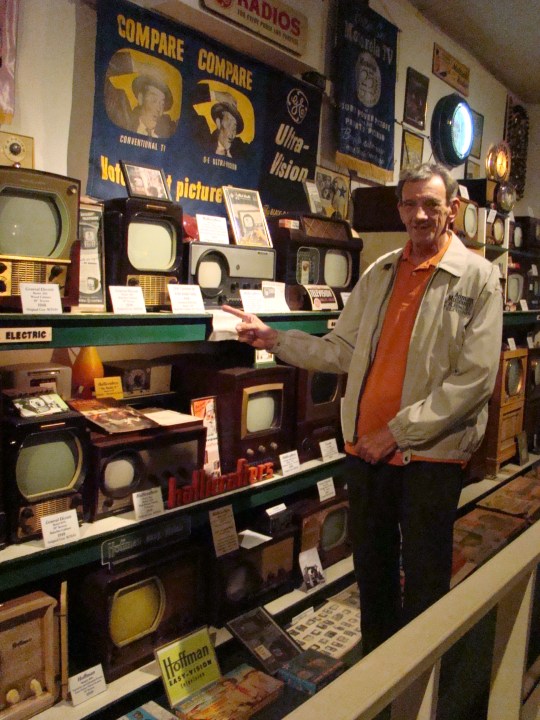 Owner, Larry, points out the first TV his family had back in 1951.