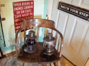 This original chair from a B&O office holds two lanterns.