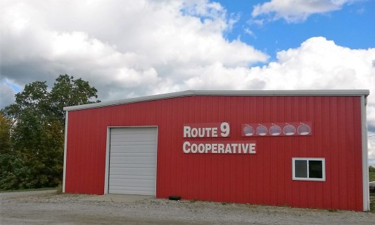 Headquarters for Route 9 Cooperative sports five chestnuts, indicating the five families that participate in the cooperative.