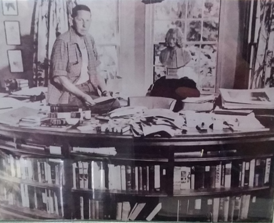 Malabar Bromfield at desk