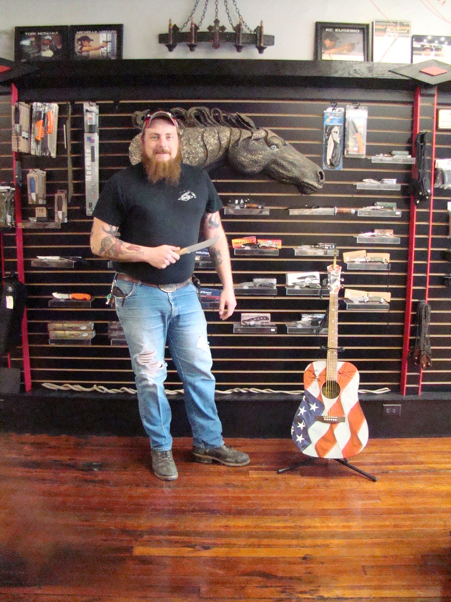 BHK Tom Casterline with Ted Nugent guitar