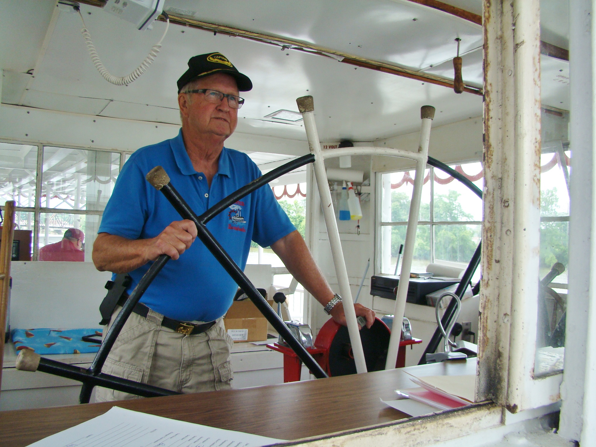 Captain Bill at wheel