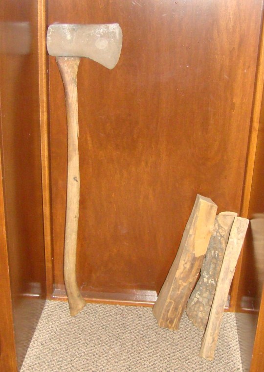 Cy - ax and wood he chopped