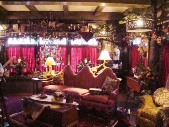 Arms Sitting Room with feather tree and wooden toys